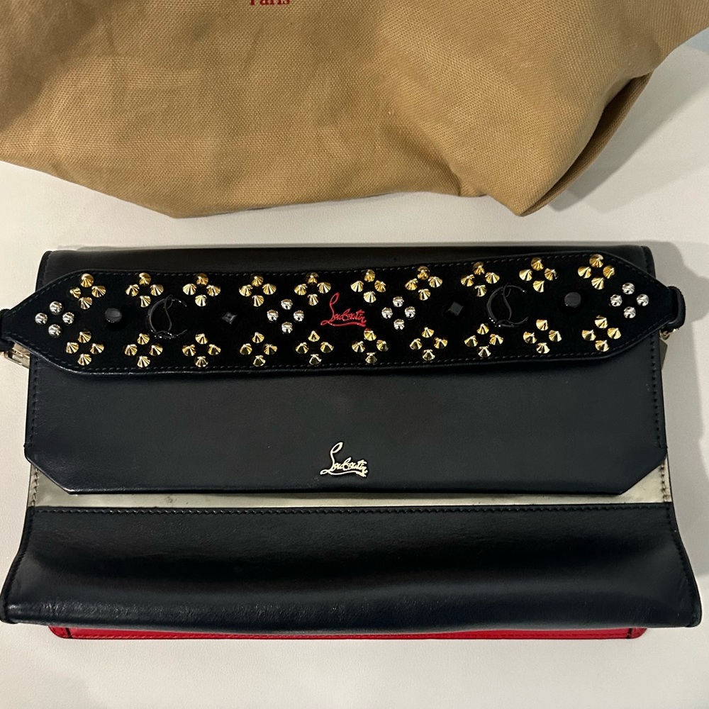 Christian Louboutin handbag with detachable chain.
